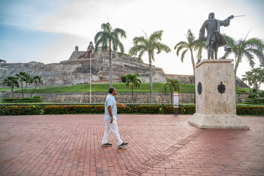 Tour guide Martin Rosales standing in front of San Felipe Castle in Cartagena