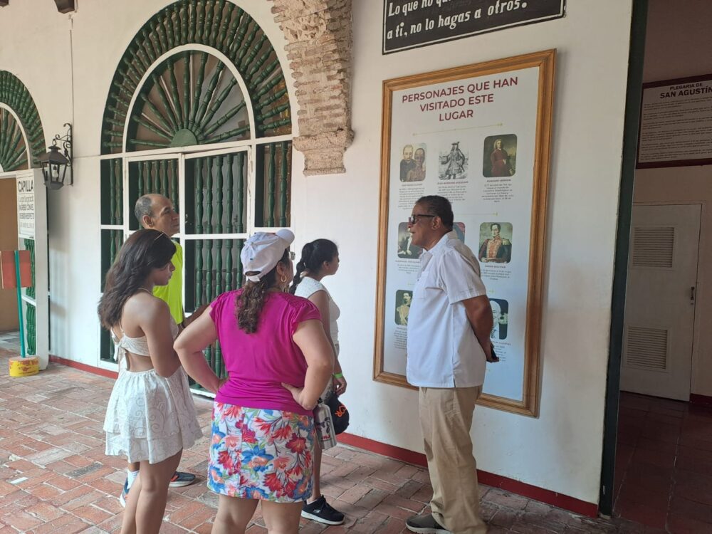 Martin Rosales and a family touring La Popa Monastery in Cartagena, Colombia